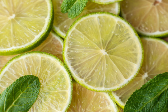A sliced lime slice on the table. Close up