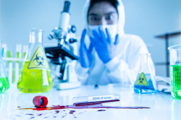 Scientist break the blood tube broken.