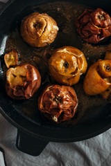 Baked apple baking in the oven in the kitchen. Healthy food