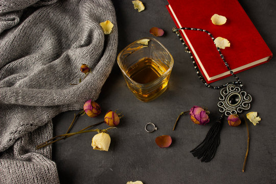 Vintage Jewelry On A Dark Background. Glass Of Whisky.