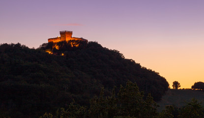 Gradara, Italy, the castle at sunset. Picturesque picture	
