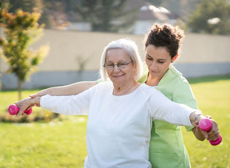 Senior woman doing sport and working out outdoors