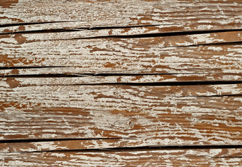 Texture of old board. Wooden scratched and dirty surface. White polished paint on the board. The table is painted with paint.