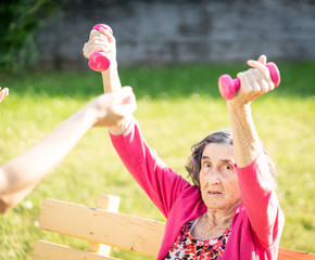 Senior woman doing sport and working out outdoors