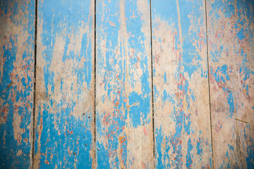 Old vintage blue and beige painted wooden planks. Rustic background texture.