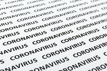 Black plain text on white paper about coronavirus outbreak. Coronavirus.