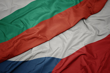 waving colorful flag of czech republic and national flag of bulgaria.