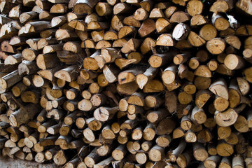 The trees were cut into pieces and stacked together.