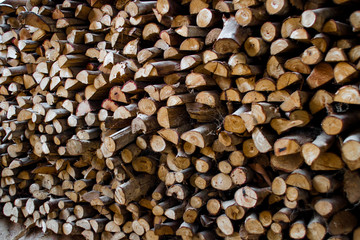 The trees were cut into pieces and stacked together.