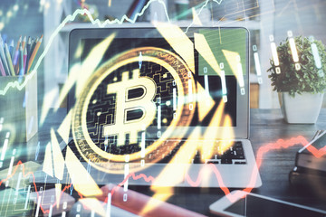 Multi exposure of blockchain and crypto economy theme hologram and table with computer background....