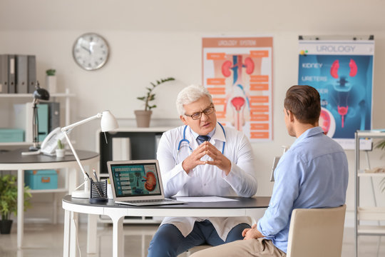 Young man visiting urologist in clinic