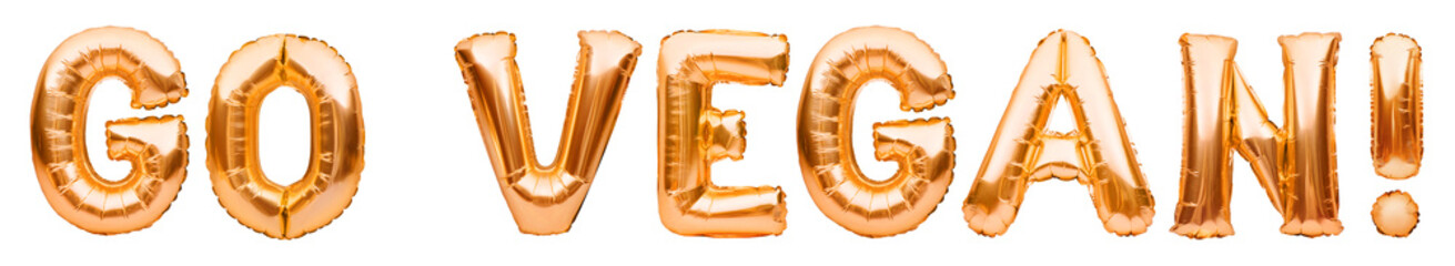 Words GO VEGAN made of golden inflatable balloons isolated on white background. Helium foil balloons forming phrase. Celebrating decoration, green food, vegan concept