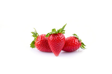 Three strawberries on a white background, isolate