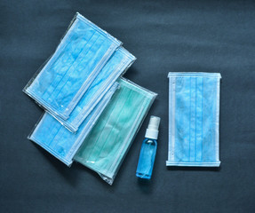 Coronavirus covid-19 prevention travel surgical masks and sanitizer for hand cleaning spread protection.
