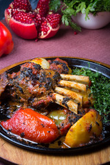 Fried lamb rack meat with vegetables