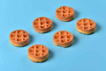 Soft Viennese waffles on a blue background
