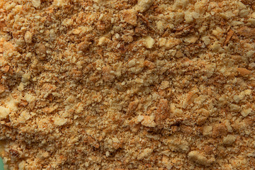 hand made delicious Napoleon cake with custard in a sprinkle of cakes