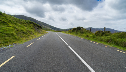 Panoramic landscape with a highway
 Empty mountain in County Kerry in Ireland.