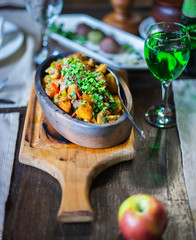 Odjakhuri: traditional georgian food with fried potatoes and meat. Selective focus.