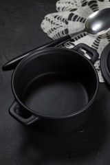 Empty dish for baking on a dark countertop.