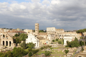 Fototapeta na wymiar Aerial panoramic cityscape view of the Roman Forum during sunset in Rome, Italy