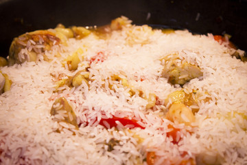 Half cooked rice for paella