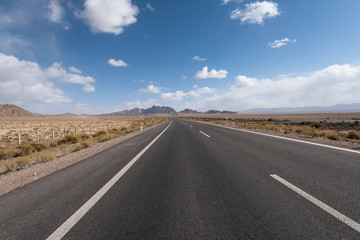Fototapeta na wymiar Gobi desert road on vast dry wilderness