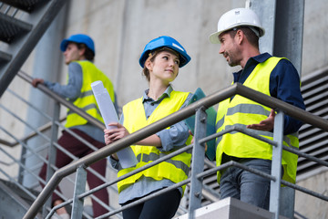 environmentalist inspectors inspecting a factory