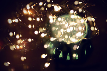 Background of defocused bokeh lights different colors. It can be used as a background, the basis...