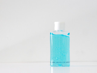 Hand Sanitizer, gel alcoholic mixture with gelatin in clear Plastic bottle with pump pushing, washing clean dirty to prevent germs protect corona virus, covid 19