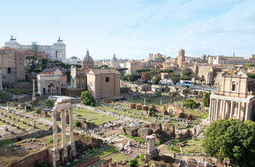 Fototapeta premium Aerial panoramic cityscape view of the Roman Forum during sunset in Rome, Italy