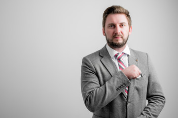 Portrait of business man wearing business clothes take out the card pocket