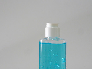 Hand Sanitizer, gel alcoholic mixture with gelatin in clear Plastic bottle with pump pushing, washing clean dirty to prevent germs protect corona virus, covid 19
