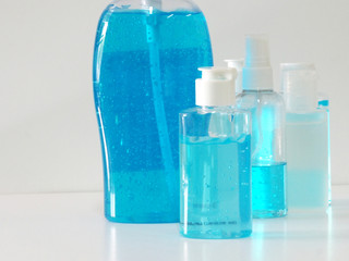 Hand Sanitizer, gel alcoholic mixture with gelatin in clear Plastic bottle with pump pushing, washing clean dirty to prevent germs protect corona virus, covid 19