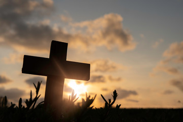 Silhouette Jesus christ death on cross crucifixion on calvary hill in sunset good friday risen in...