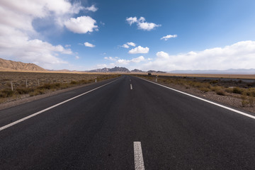 Fototapeta na wymiar Gobi desert road on vast dry wilderness