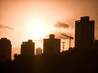 Naklejka premium sunset over city