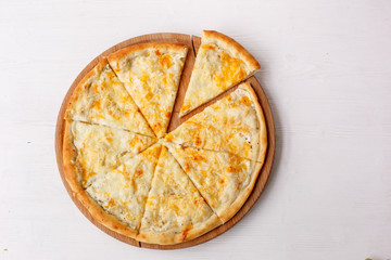 Italian Fast food pizza 4 cheeses on a white background