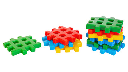 Fototapeta premium Multicolored toy blocks isolated on white background.