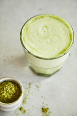 Matcha latte on a bright background