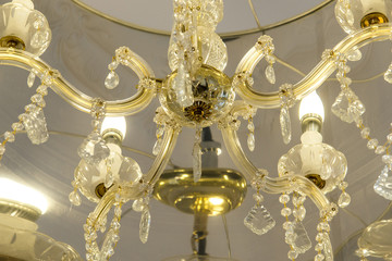 The crystal chandelier on the ceiling is a precious addition to the interior, creating an effect of magic in the evening.