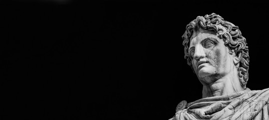 Ancient marble statue of mythical character Castor or Pollux, dated back to the 1st century BC, located at the top of monumental balustrade in Capitoline Hill, in Rome (Black and White with copy space