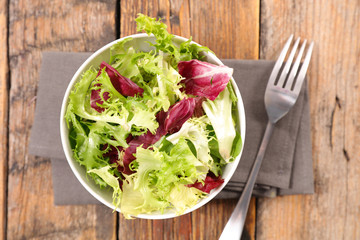 bowl of lettuce and fork