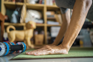 Push up in living room. Exercising at home.