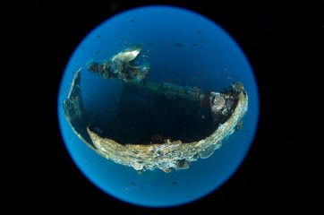 Liberty shipwreck. Tulamben, Bali, Indonesia. Wide angle underwater photography. Fisheye lens.