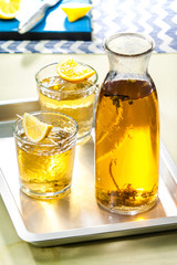 summer lemonade in a carafe with fruit