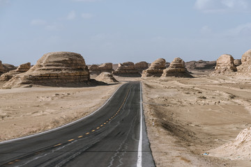Gobi desert road on vast dry wilderness