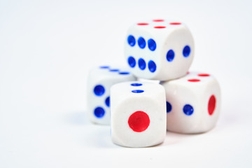 Four dice, cubes on a white background, space for text