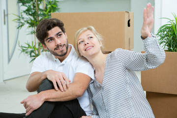 young couple imagining their new flat