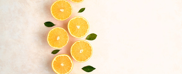 Fresh oranges on on the kitchen board. Top view.